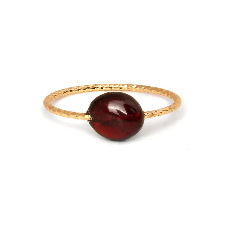 Geometric shaped agate ring for women on a hand, showing original design and coloured stone.