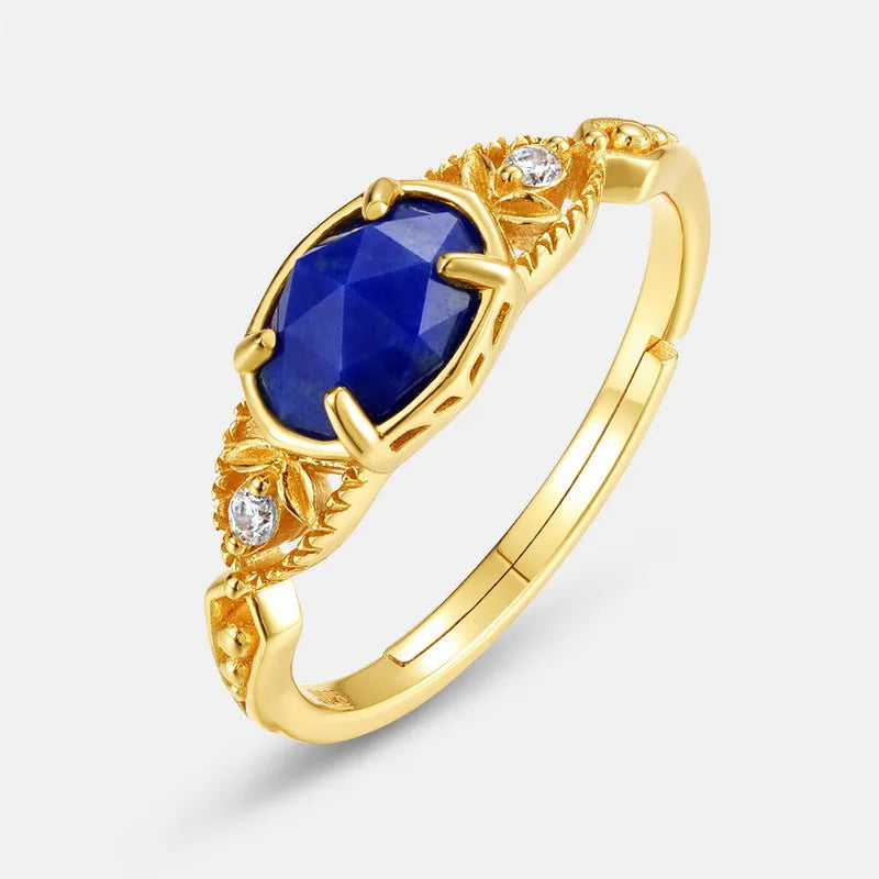 Women's oval geometric silver ring with deep blue lapis lazuli stone and round elements
