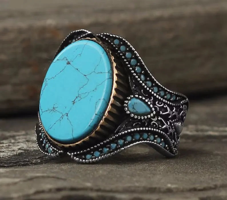 Men's antique silver alloy ring with turquoise centre in simple round design