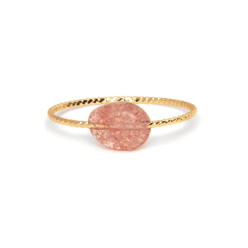 Geometric shaped agate ring for women on a hand, showing original design and coloured stone.