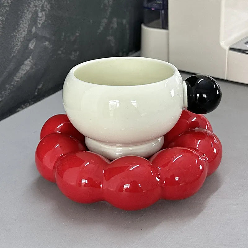 Ceramic coffee set with a 250ml cup and matching dish in a simple solid colour design.