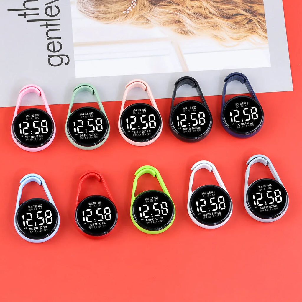 LED digital wristwatch showing time and week day on display, with plastic strap.