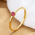 Women's geometric circle ring with single diamond in copper, available in multiple colours and sizes