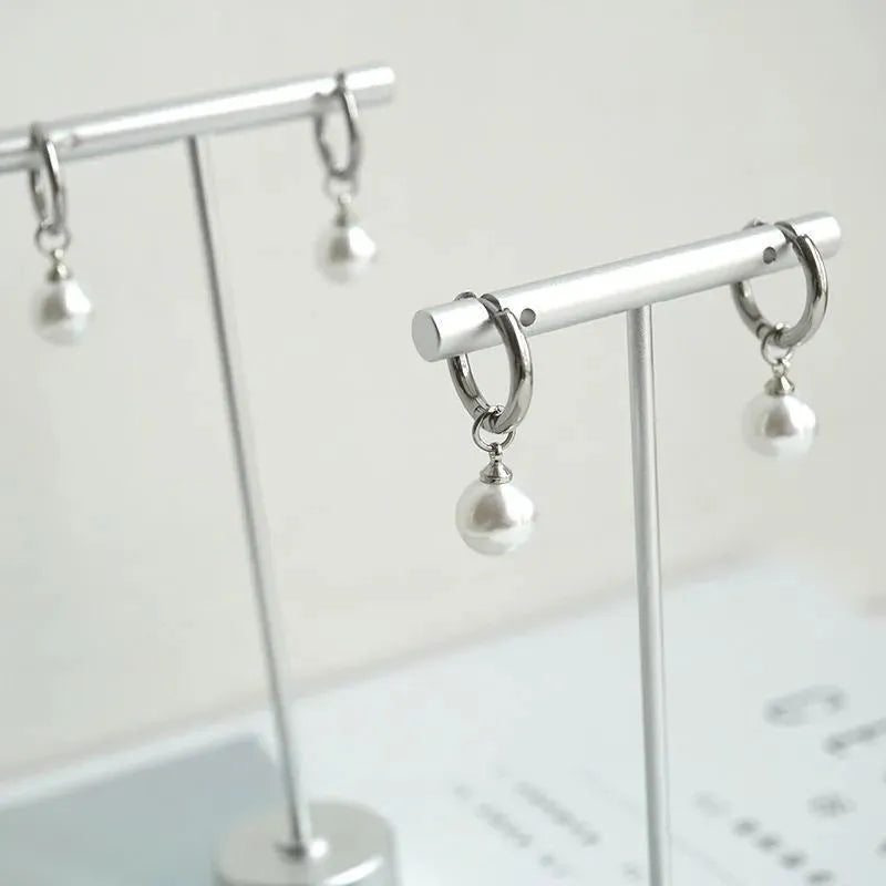 Geometric round pearl earrings with titanium steel alloy construction for women