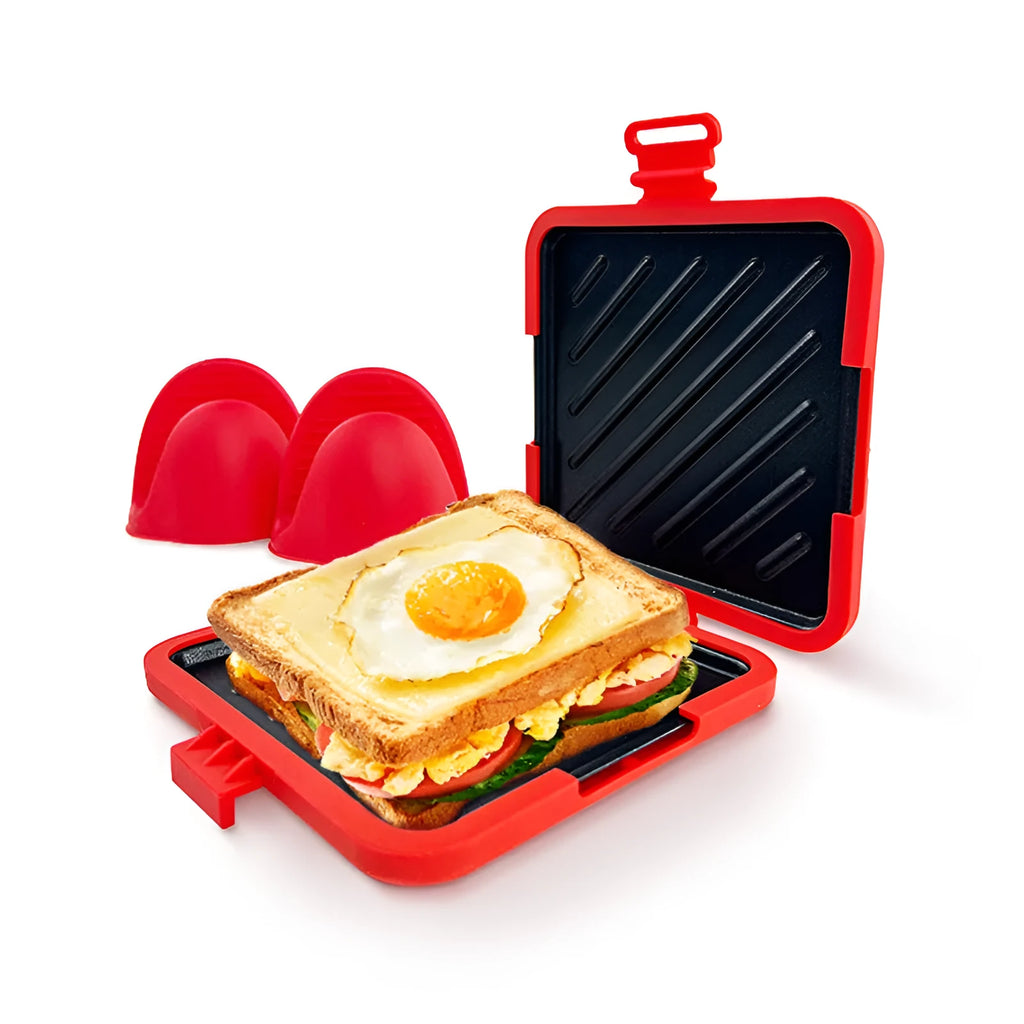 Red silicone baking tray with heat-resistant gloves on kitchen counter