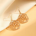 Spiral donut jewellery set showing gold tone necklace, bracelet and earrings with geometric circular design