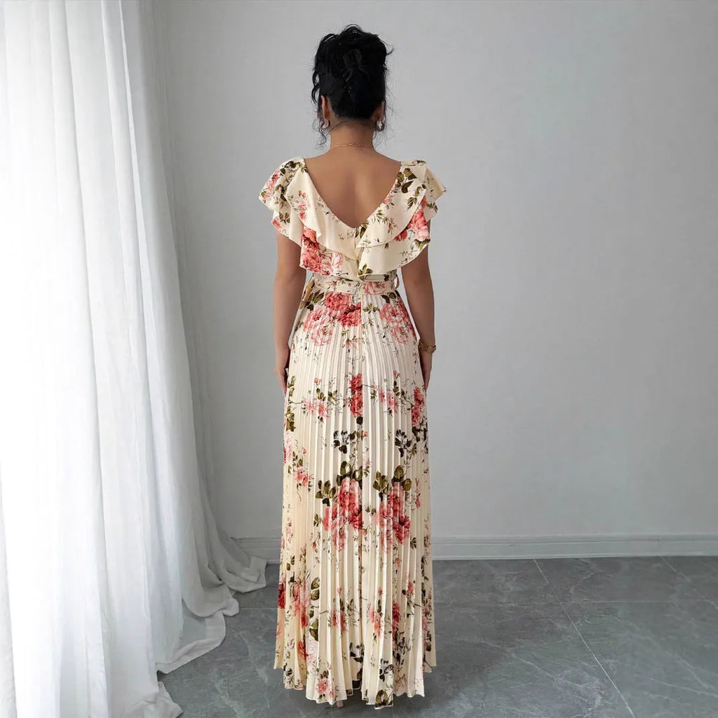 Apricot floral print women's dress with V-neck, ruffled sleeves, high waist, and long swing skirt
