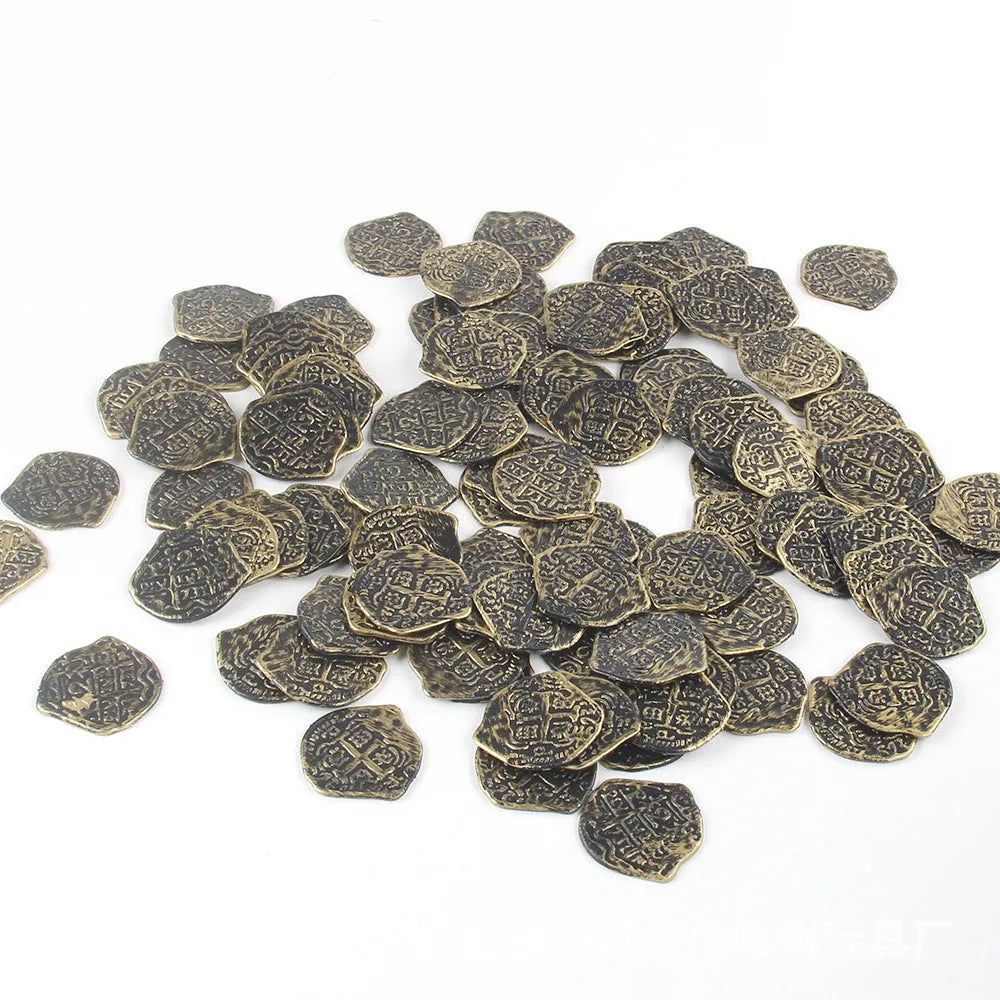 Pile of 100 bronze plastic Roman replica coins with electroplated finish for pirate props