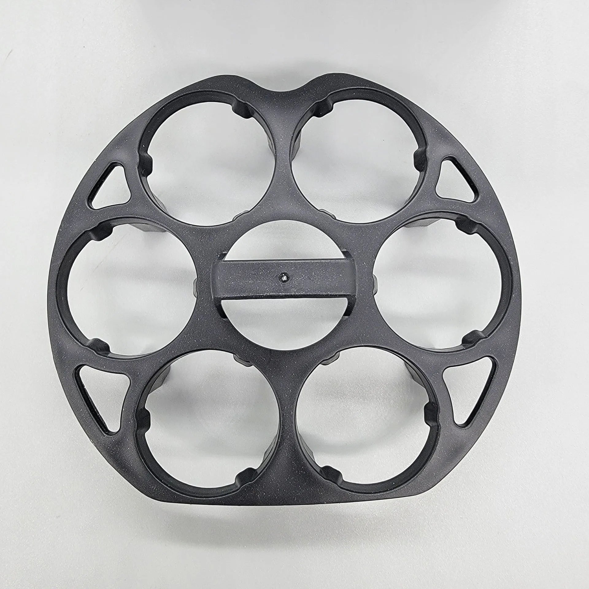 Black plastic egg holder basket with retainer, dimensions 13.8 by 12.6 cm.