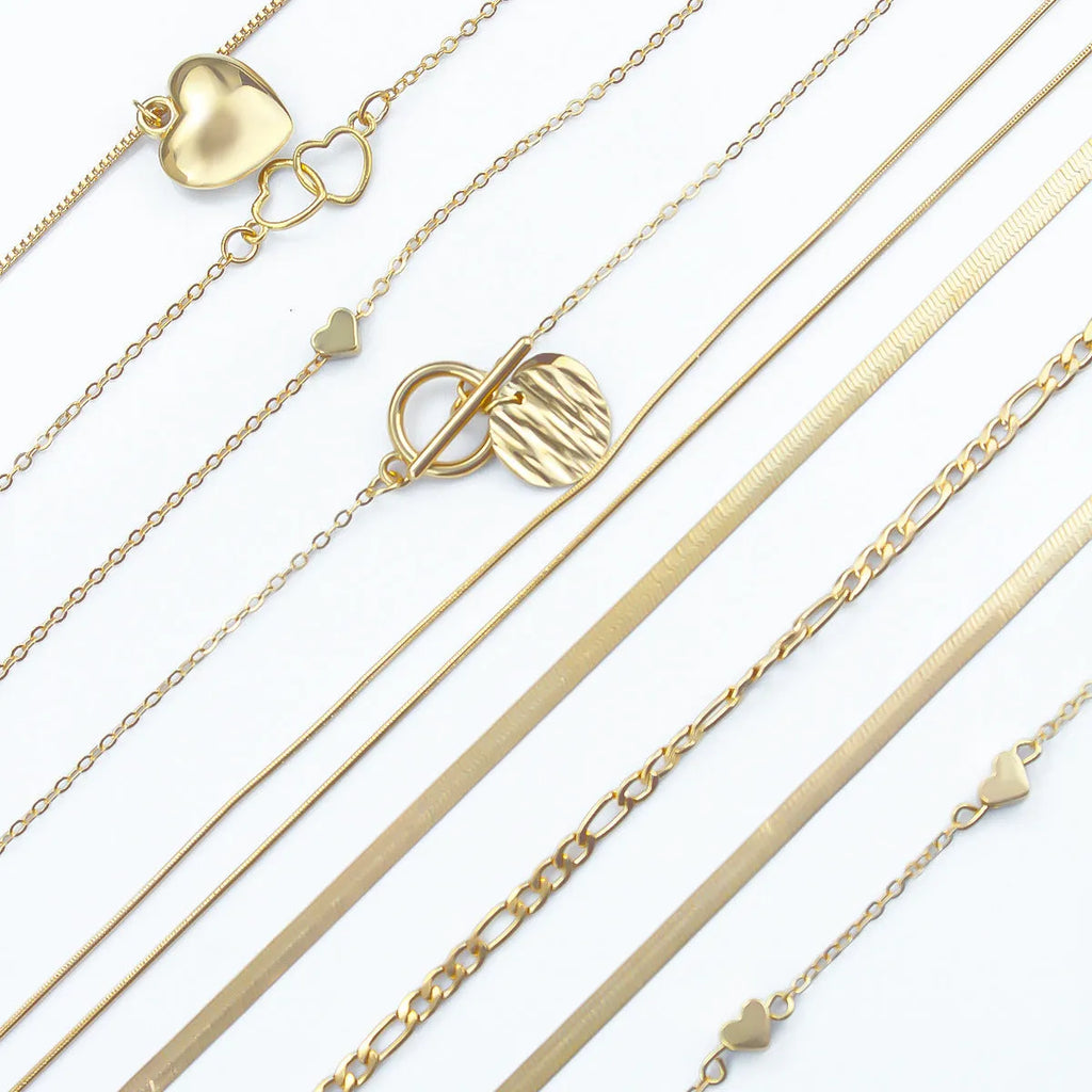 10-piece gold necklace set for women with adjustable snake bones chain and simple alloy pendants