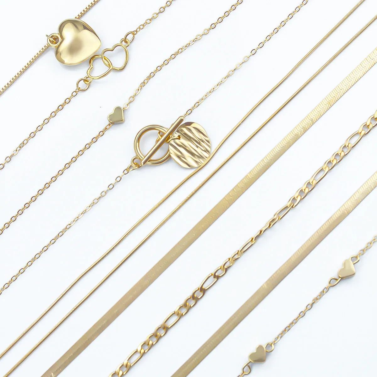 10-piece gold necklace set for women with adjustable snake bones chain and simple alloy pendants