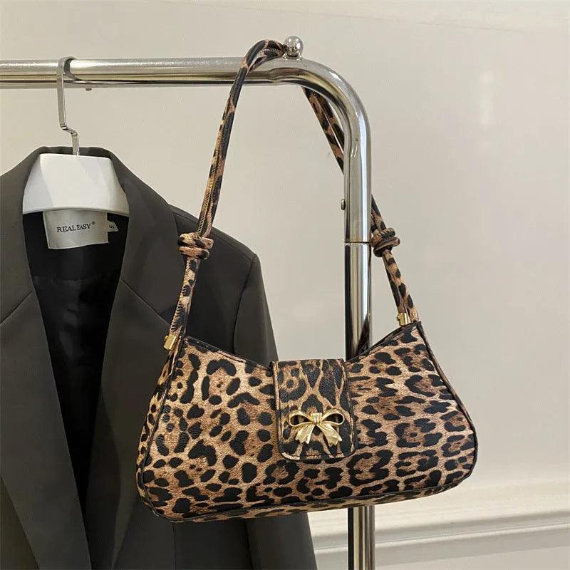 Casual PU leather handbag with sandwich pocket in black colour showing dimensions and design