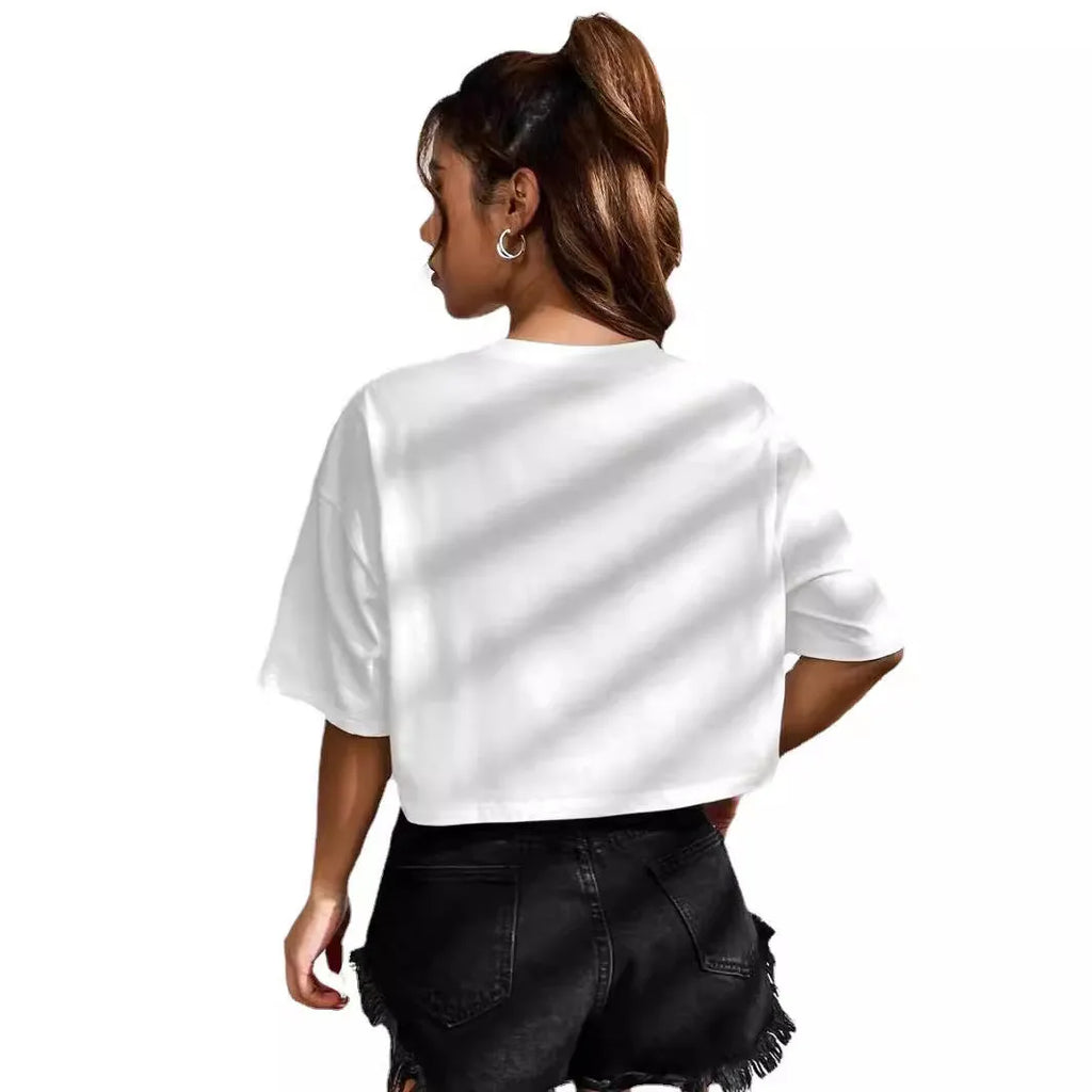 Women's black cotton t-shirt with white printed English letters, loose fit, short sleeves, and exposed navel design.