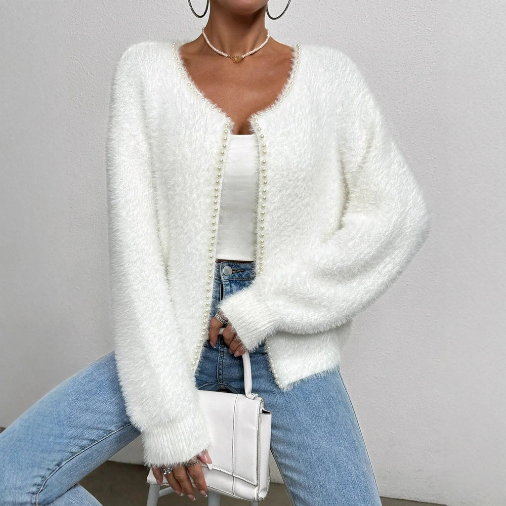 White women's V-neck cardigan sweater in polyester knit fabric