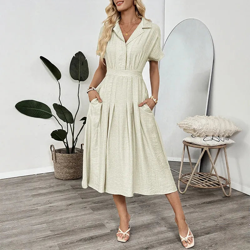 Light green women's shirt dress with a lapel collar, waist tie belt, and a chest pocket.