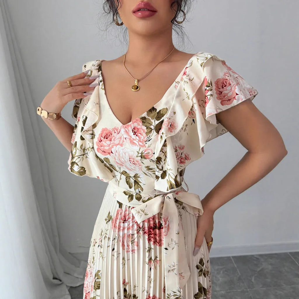 Apricot floral print women's dress with V-neck, ruffled sleeves, high waist, and long swing skirt