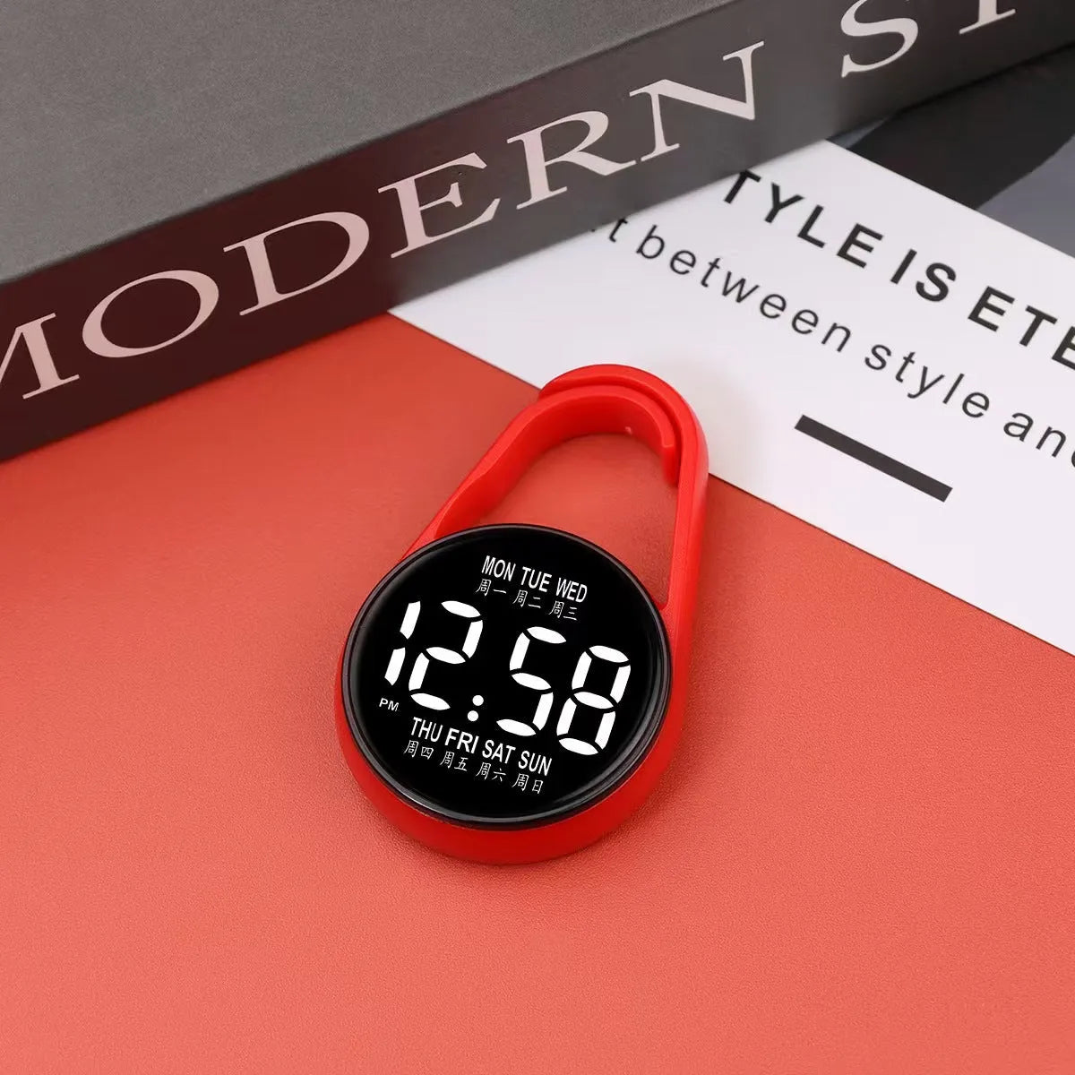 LED digital wristwatch showing time and week day on display, with plastic strap.