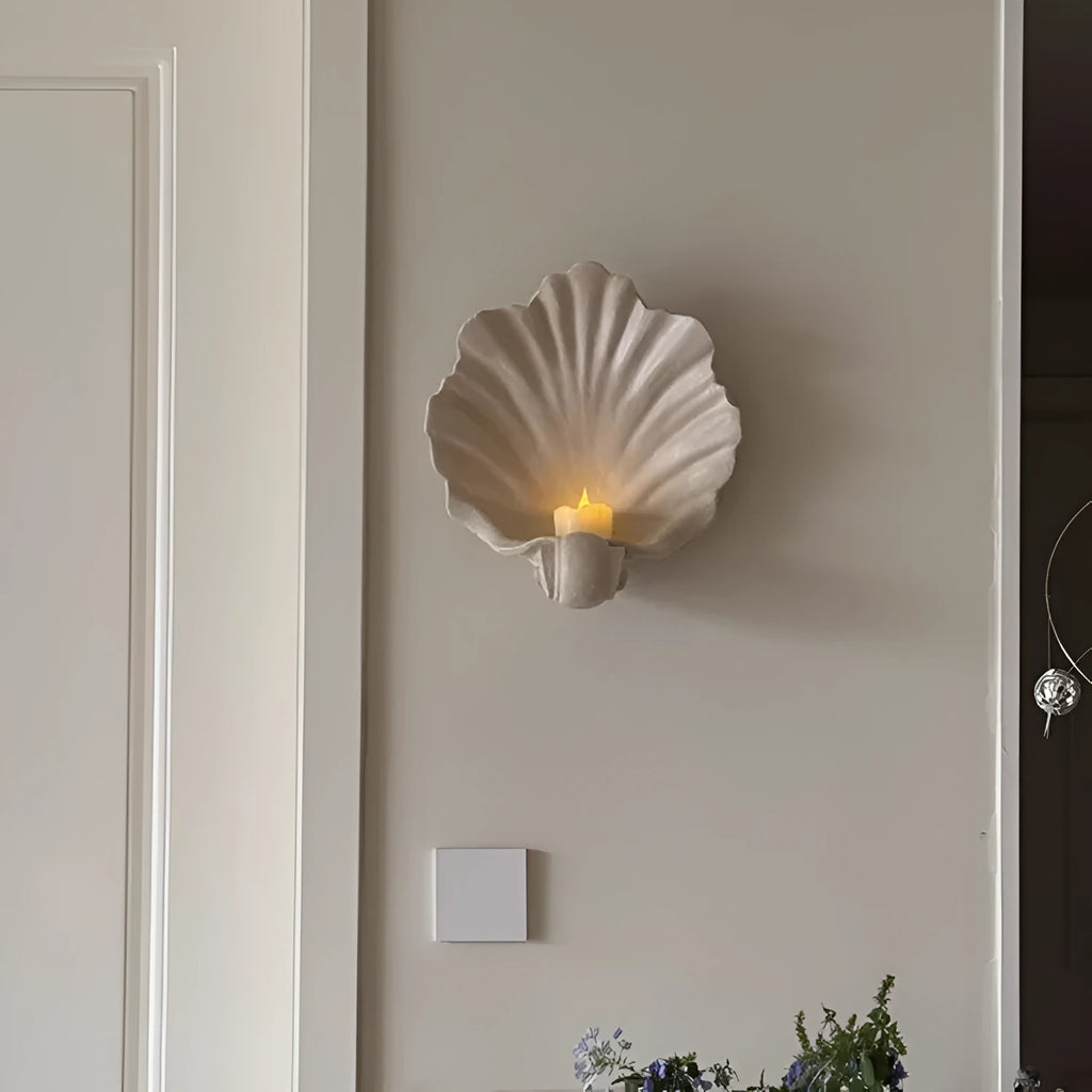White resin simulation shell fruit plate ornament on a table