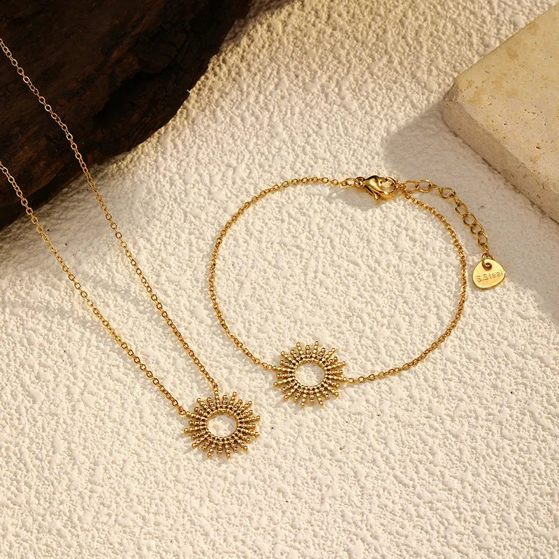 Sunflower Series gold necklace and bracelet set with geometric chain design