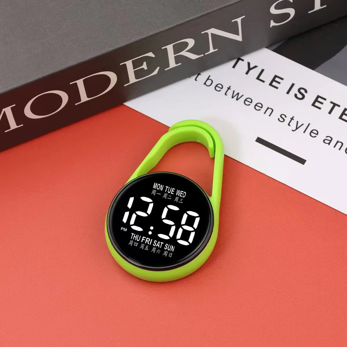 LED digital wristwatch showing time and week day on display, with plastic strap.