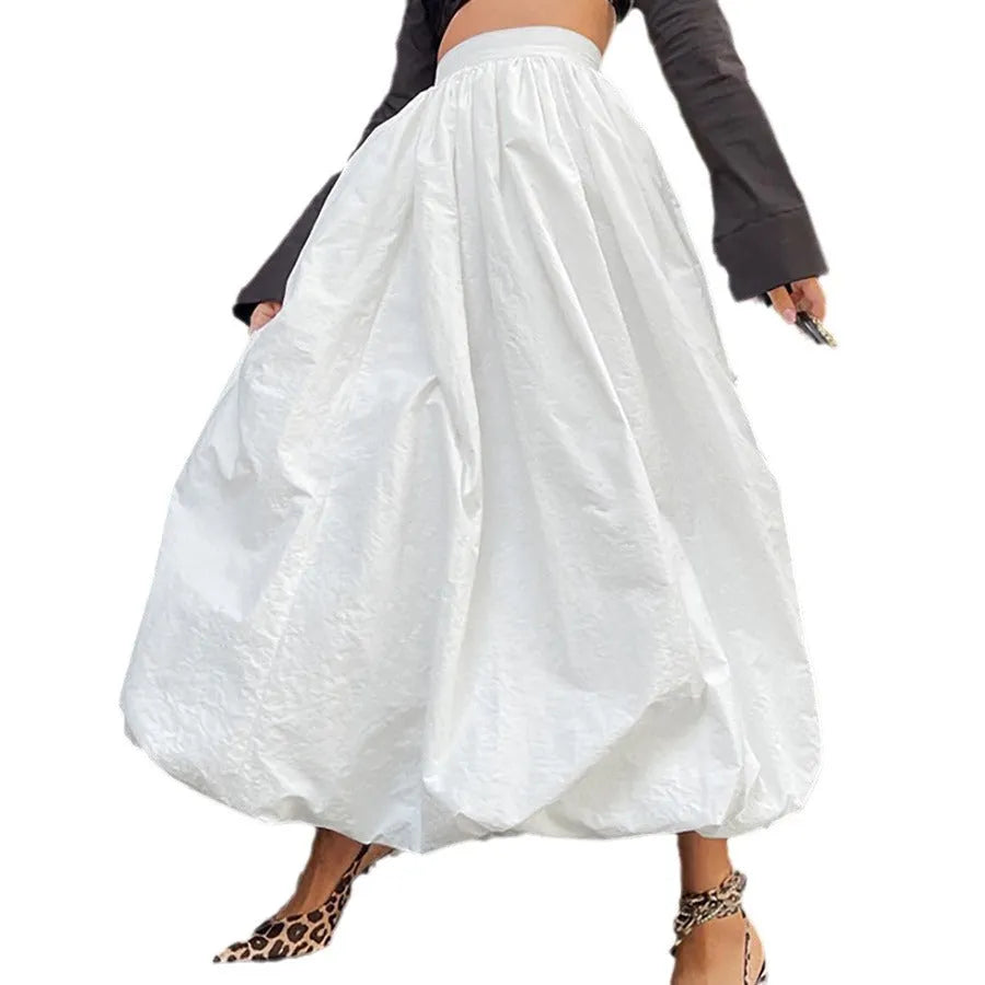 Women's solid colour cotton midi skirt in black or white showing long length