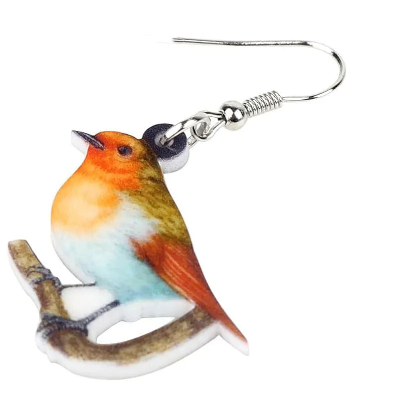 Acrylic blue titmouse pendant earrings with snake charm detail and printed animal design