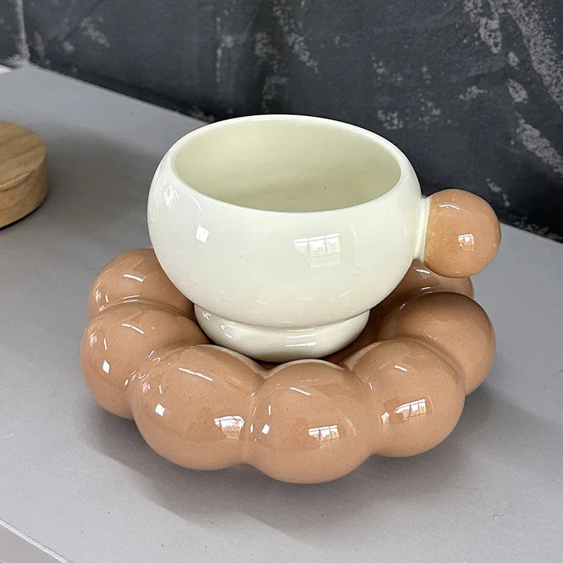 Ceramic coffee set with a 250ml cup and matching dish in a simple solid colour design.