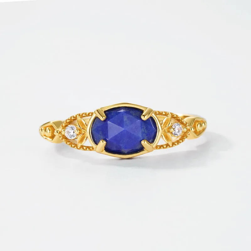 Women's oval geometric silver ring with deep blue lapis lazuli stone and round elements