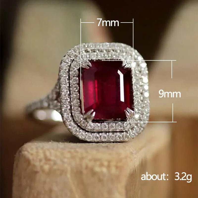 Copper women's ring with a square red rhinestone in a geometric setting.