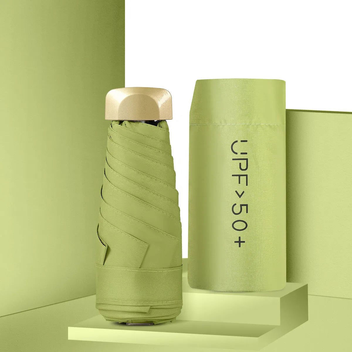 Closed five-fold mini pocket sun umbrella showing compact size and rubber handle