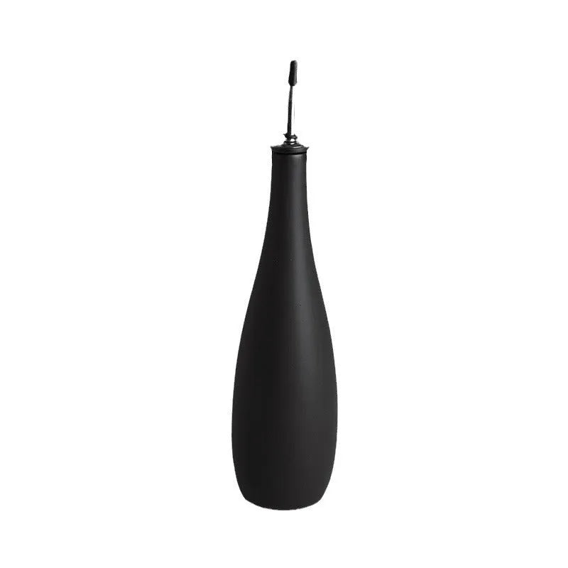 Ceramic oil pot with funnel available in black coffee and white colours with 650ml capacity