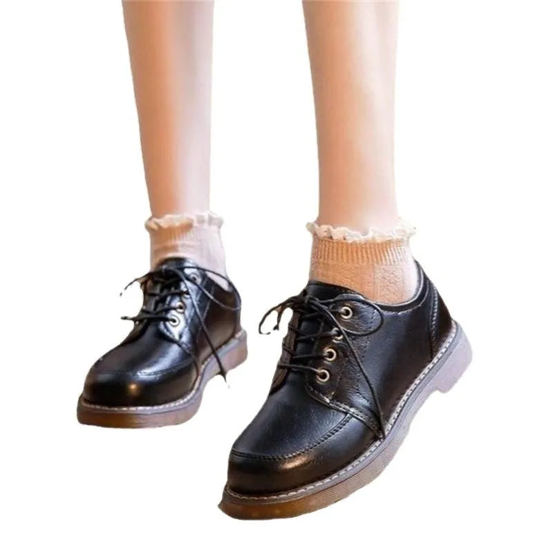 Women's black retro Mary Jane pumps with square heel and front lace-up closure