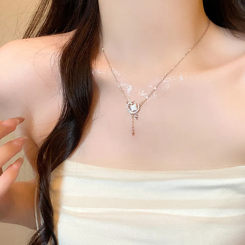 Gold star and moon pendant necklace with zirconium crystal on adjustable copper chain