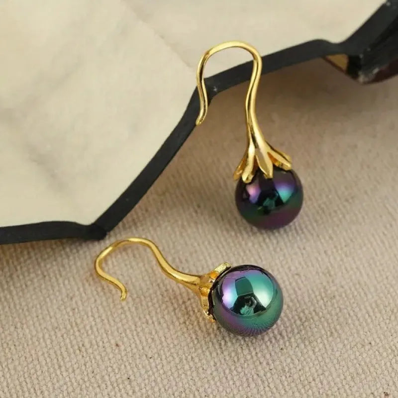 Gold tone retro fashion drop dangle earrings for women with electroplated alloy construction