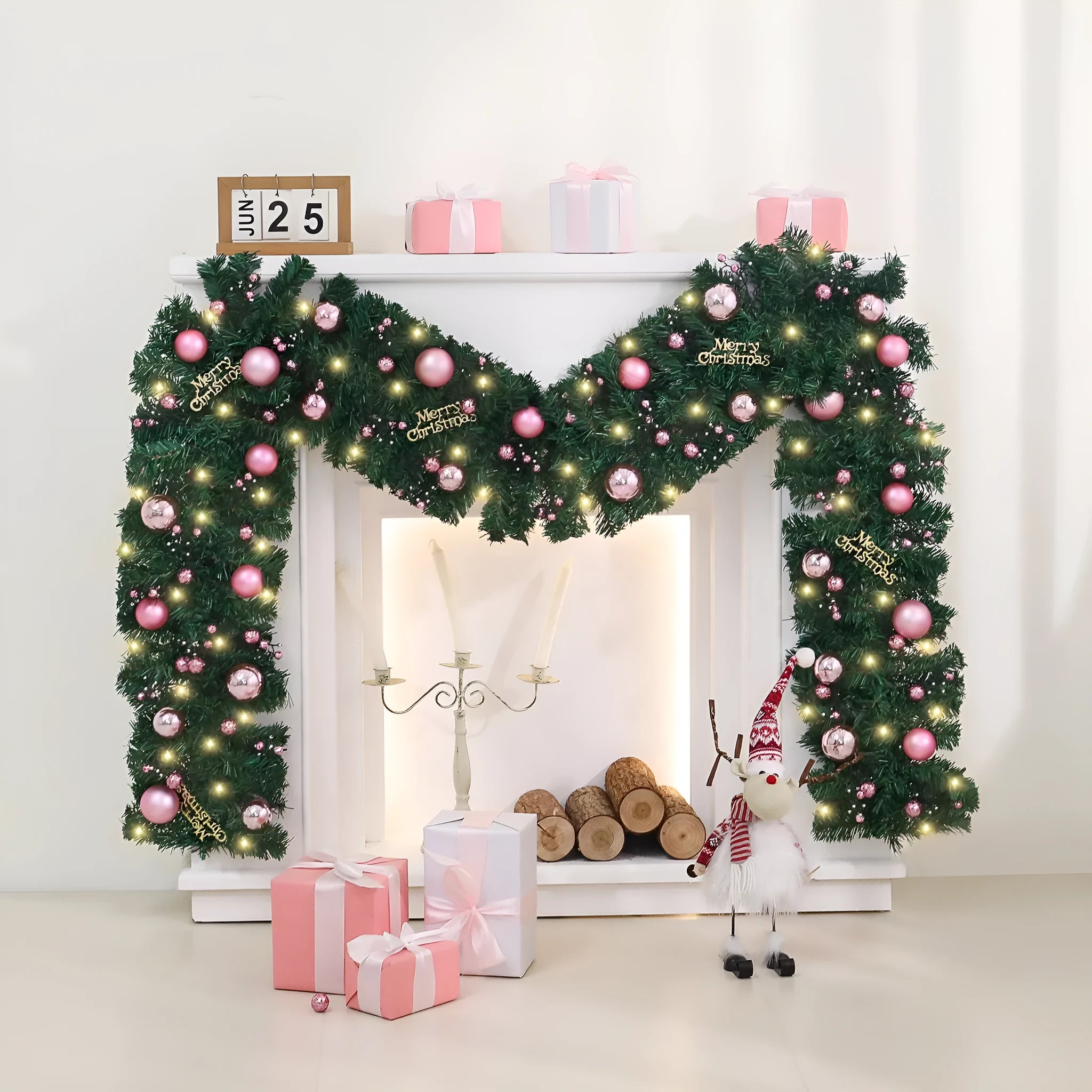 2.7 metre pink small fruit Christmas rattan garland with wrought iron frame draped along wall