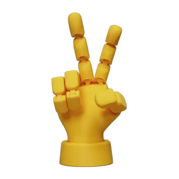 Yellow 3D printed hand props with movable joints for photography and displays