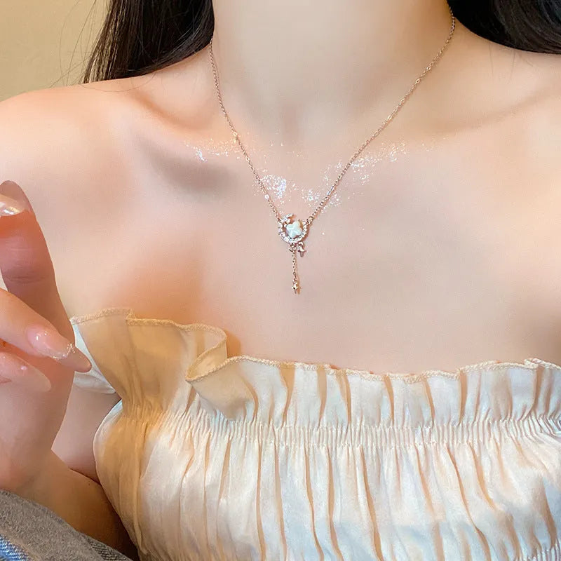 Gold star and moon pendant necklace with zirconium crystal on adjustable copper chain