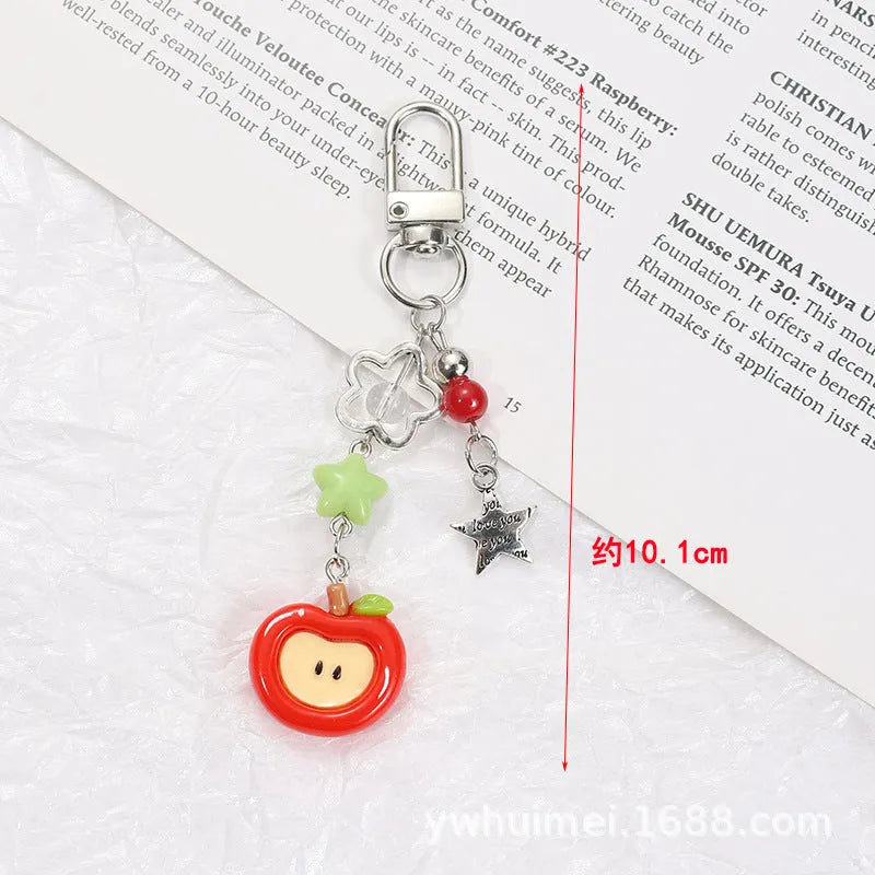 Plastic resin mobile phone charm keychain with fruit patterns including apple and strawberry designs