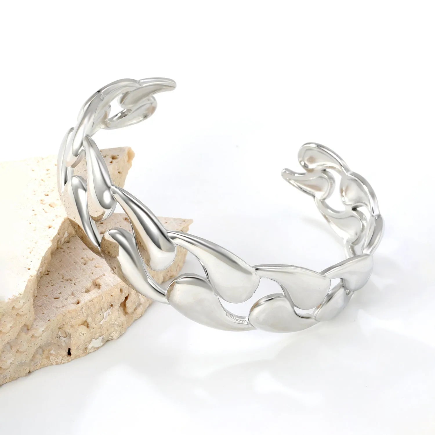 A stainless steel bracelet in an advanced European style design on a wrist.