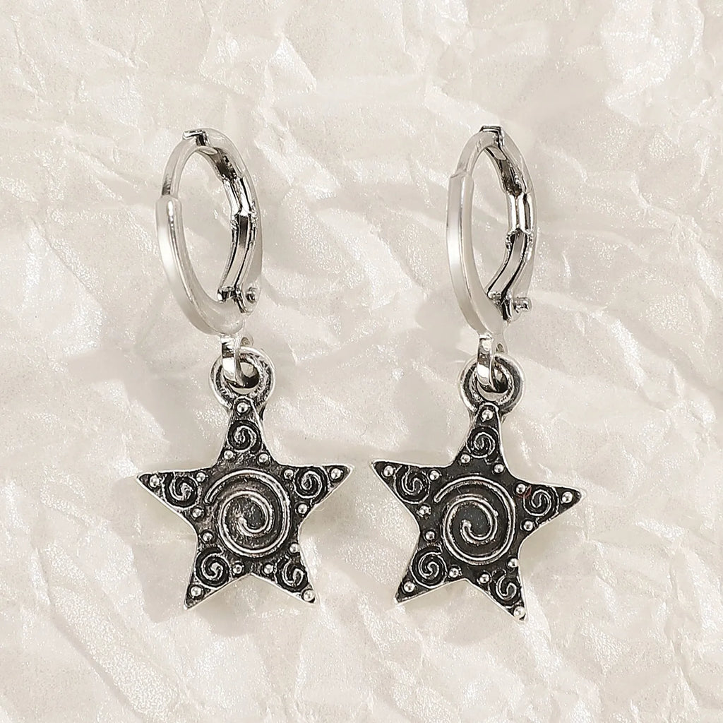 Women's alloy earrings in cross, heart and animal designs with multiple colour options