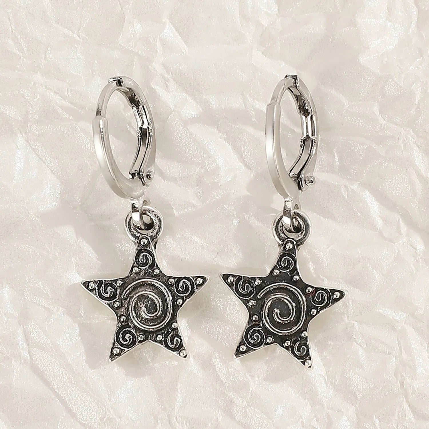 Women's alloy earrings in cross, heart and animal designs with multiple colour options