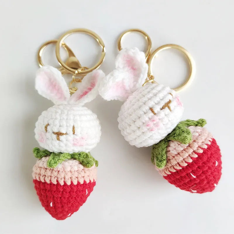 Hand-woven white wire rabbit pendant with strawberry motif and attached key