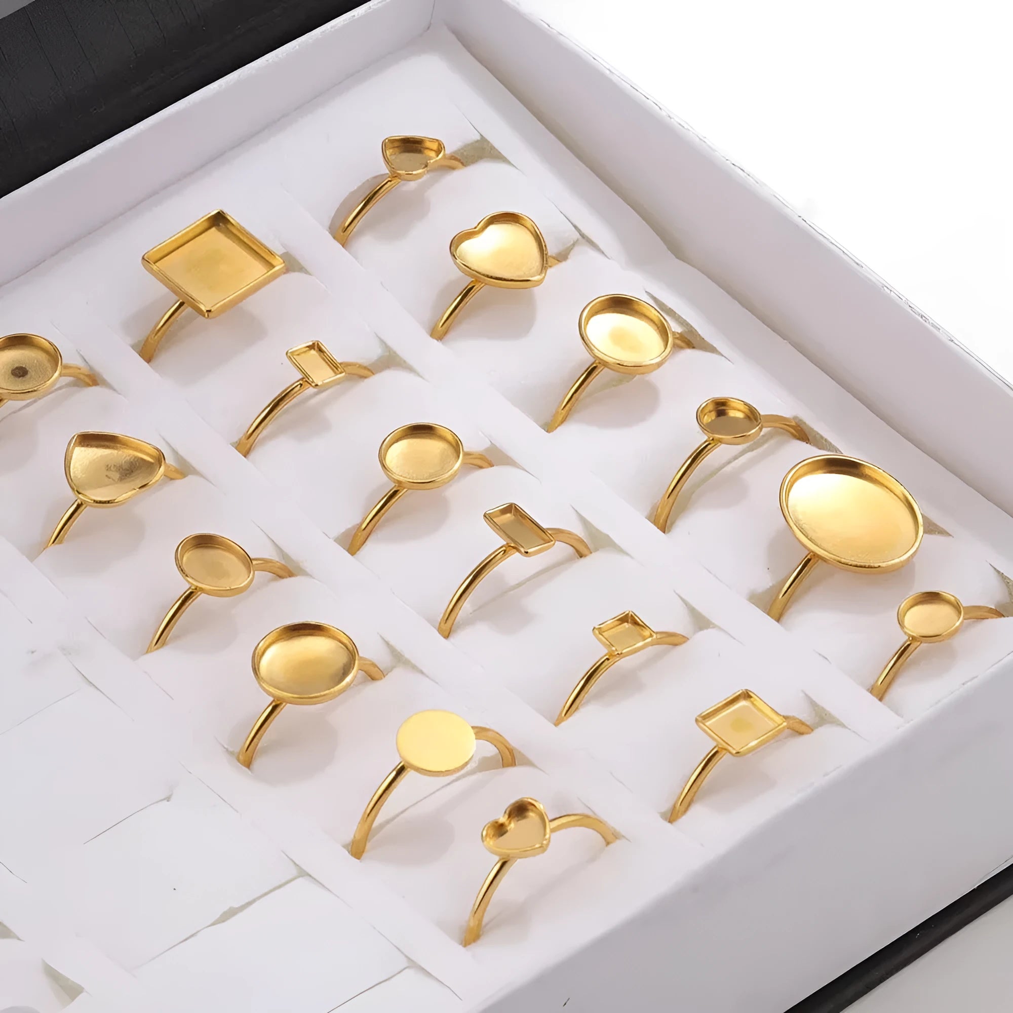 Golden electroplated stainless steel ring settings in various shapes with totem pattern texture and ring holder