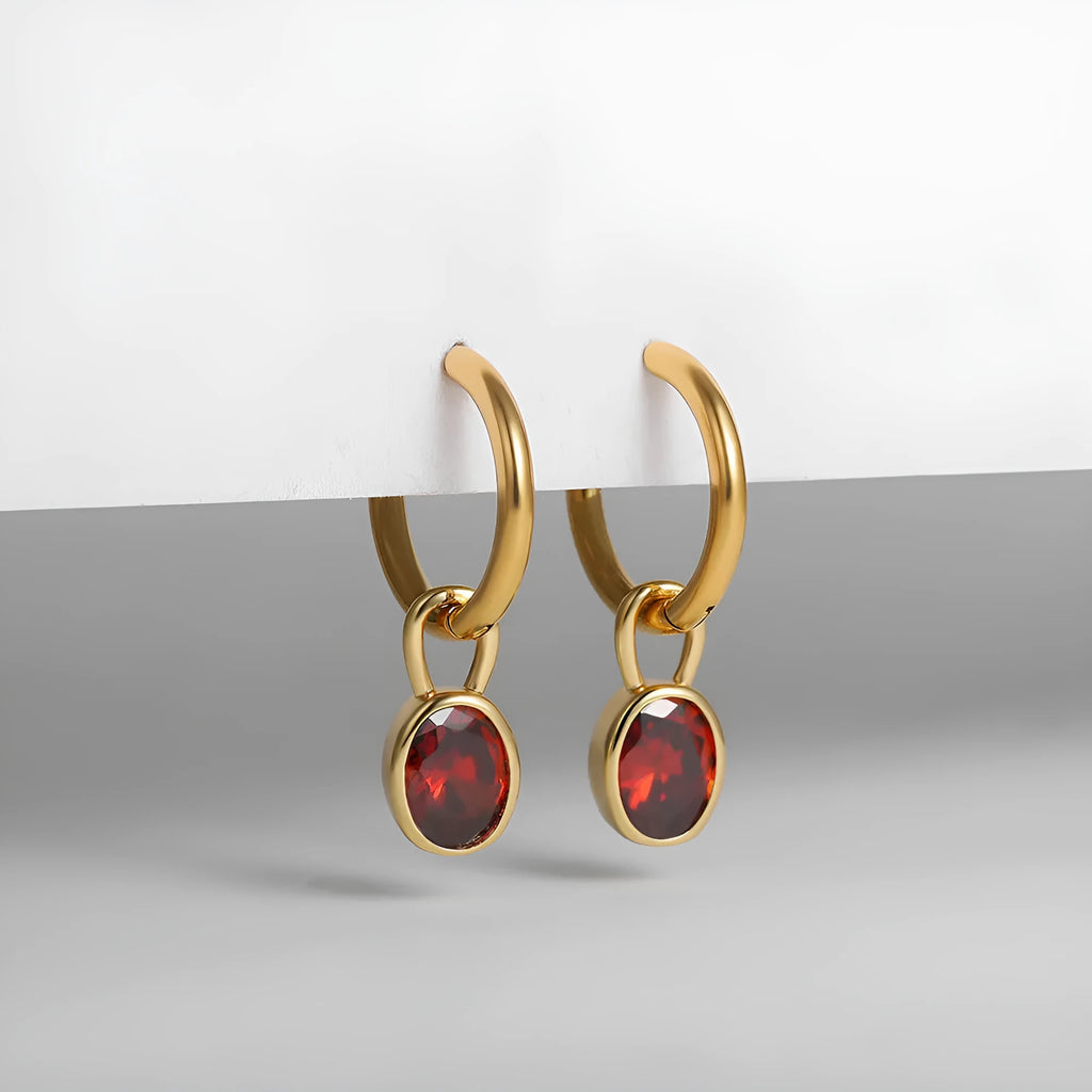 Women's retro-style oval zircon earrings in copper, showing multiple colour options.