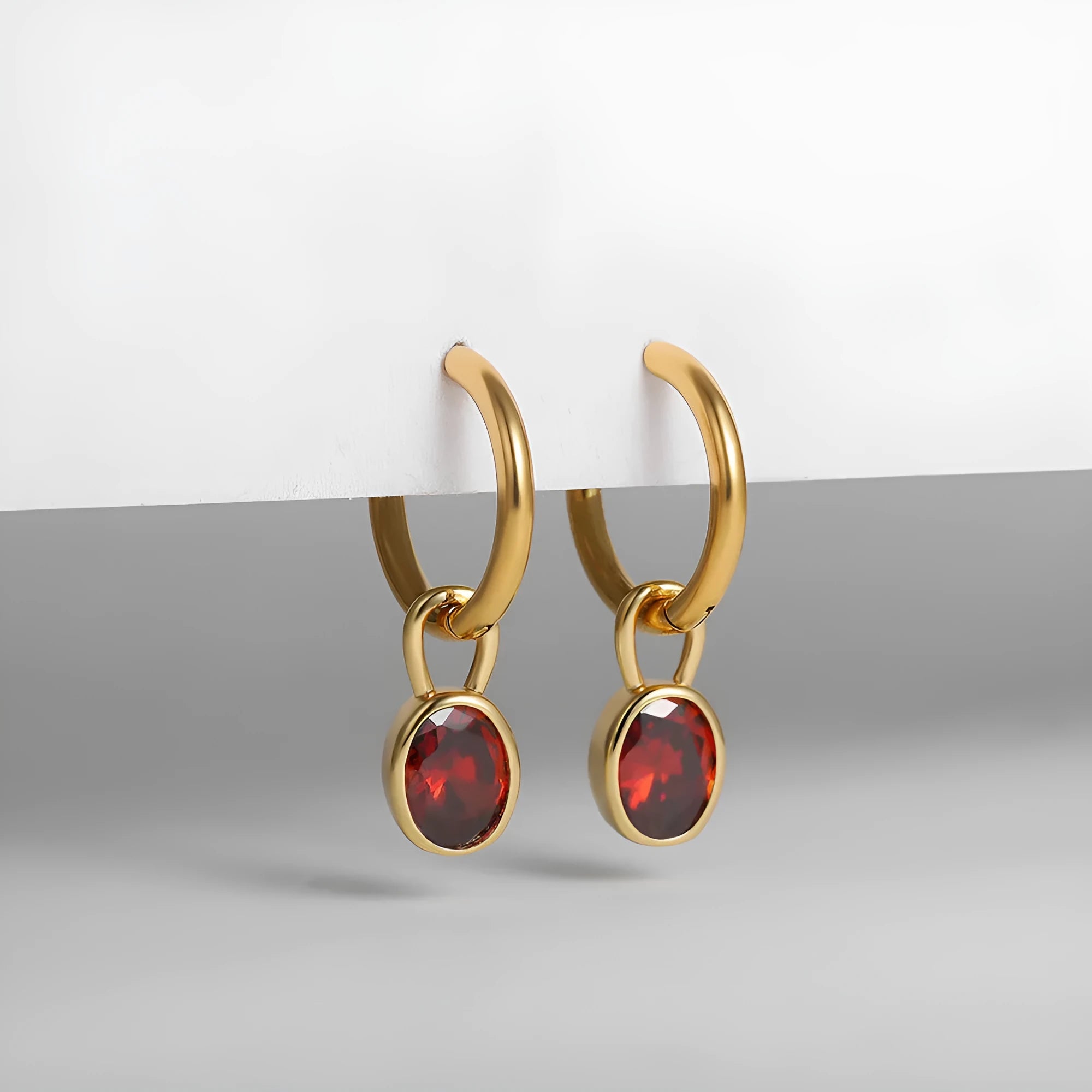 Women's retro-style oval zircon earrings in copper, showing multiple colour options.