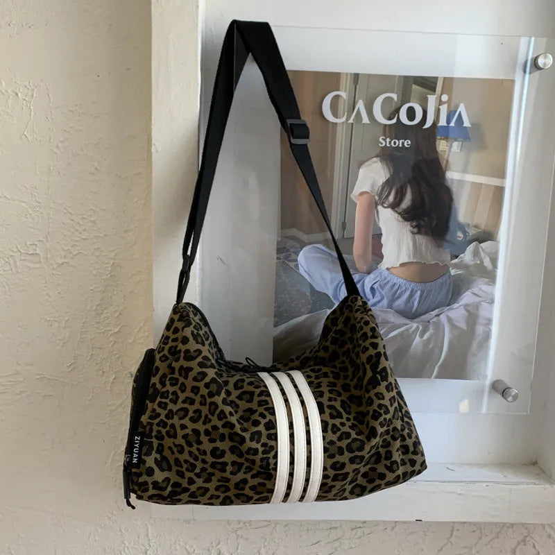 Leopard print shoulder messenger bag with stripe option and visible stitching details