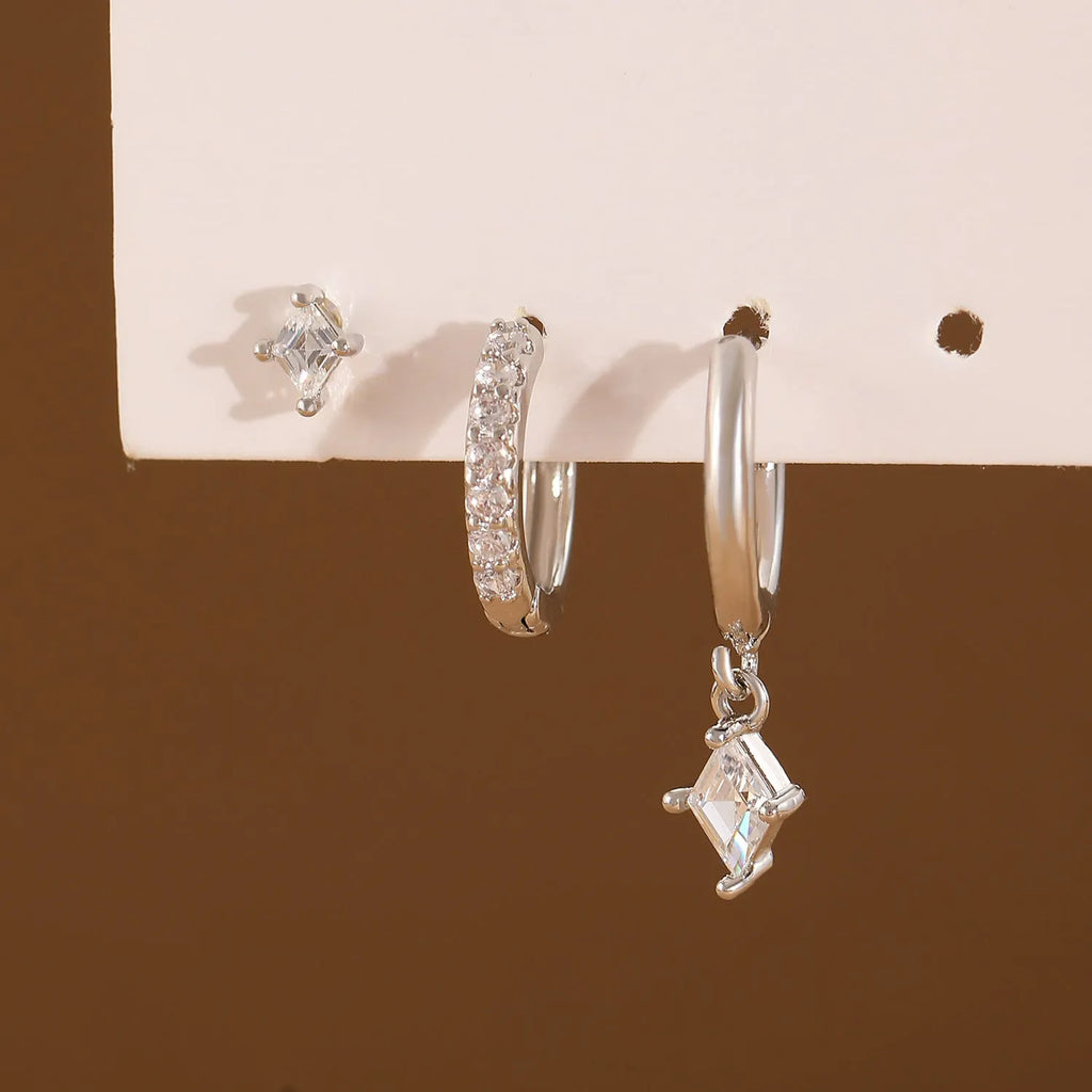 Three-piece ladies earring set with geometric zircon patterns on copper in gold and white colours
