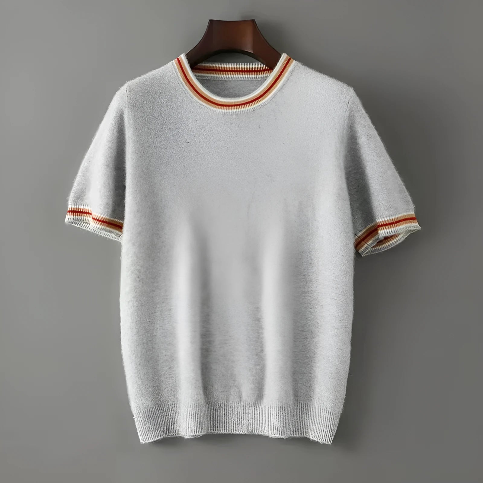 Men's grey pure wool short sleeve pullover sweater with round neck on a hanger.