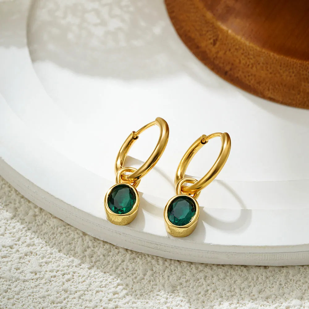 Women's retro-style oval zircon earrings in copper, showing multiple colour options.