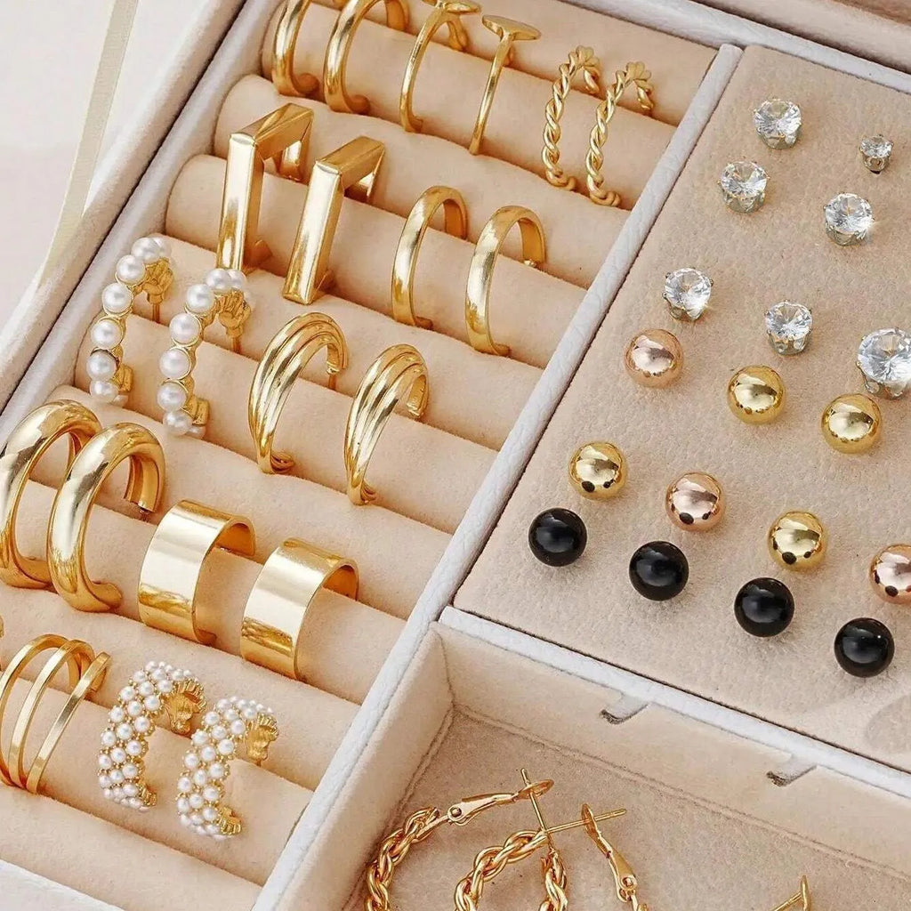108 gold and yellow geometric alloy pearl earrings arranged in a set.